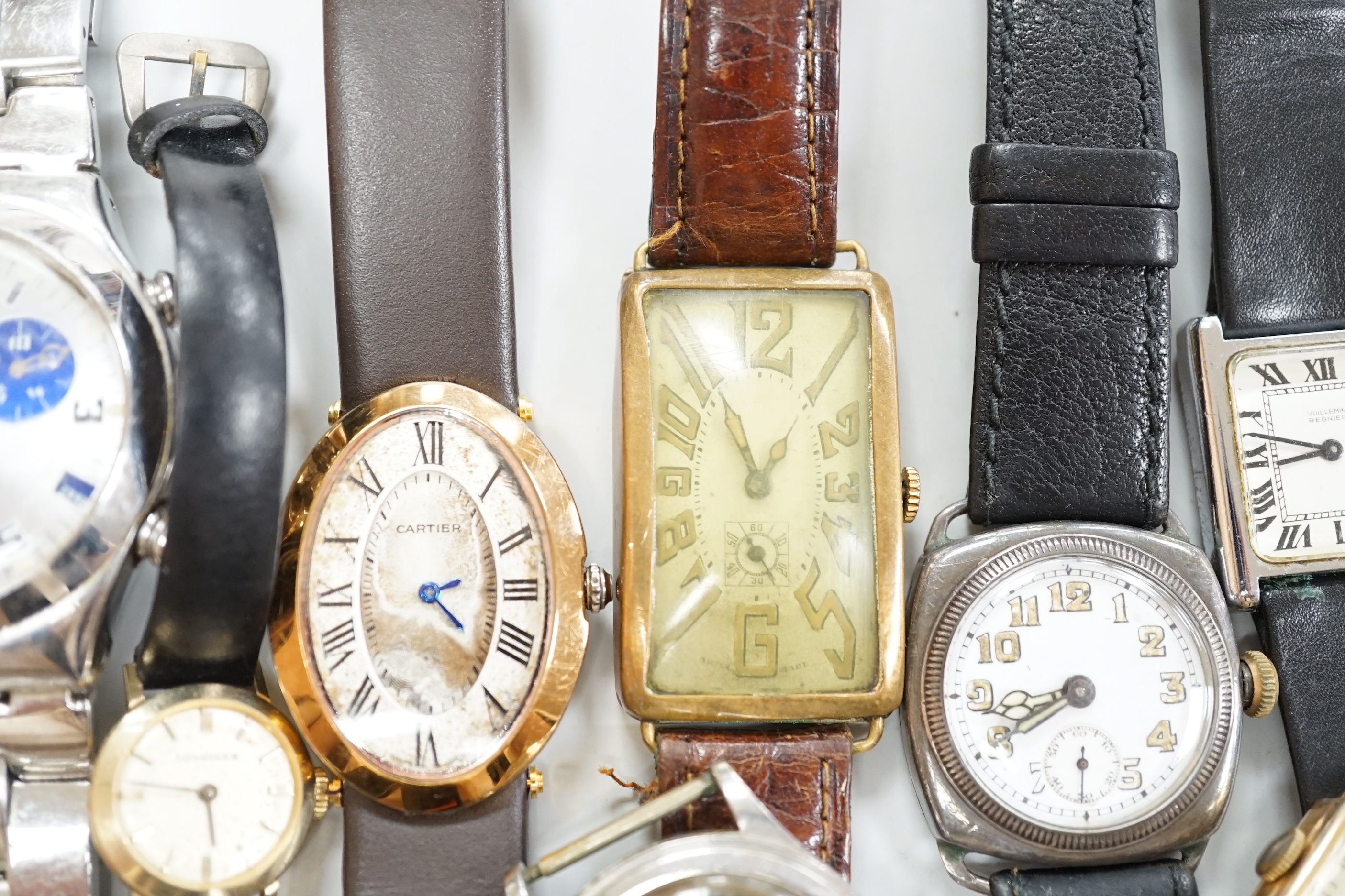Five gentleman's assorted wrist watches including Swatch and early 20th century white metal and two lady's wrist watches.